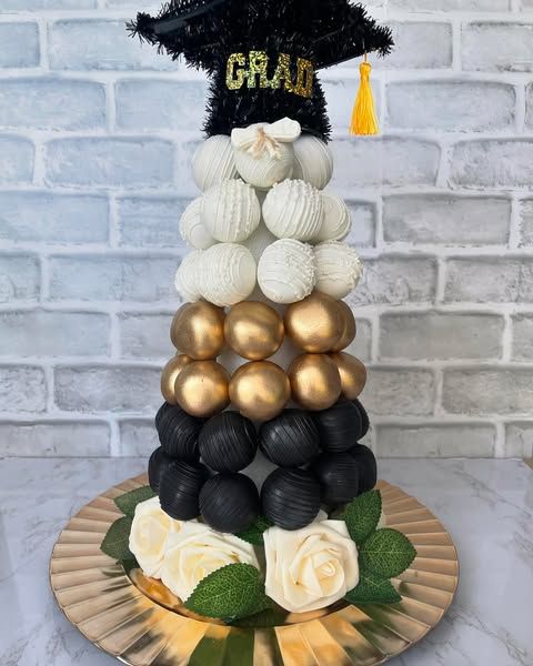 Handcrafted graduation dessert arrangement by Sweet Natalia