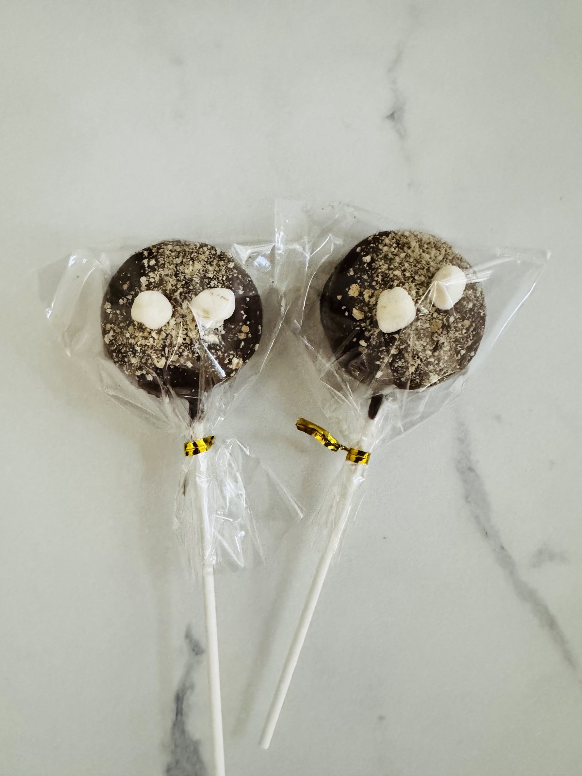 Dark chocolate cake pops with crumb topping
